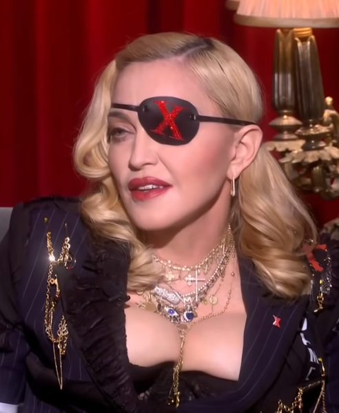 Once Madonna admits to eating while wearing the grillz. 